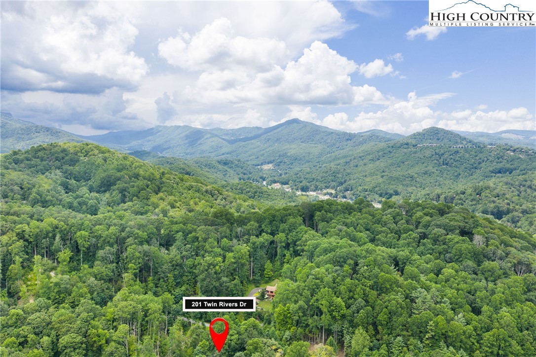 Lot 201 Twin Rivers Drive Boone, NC 28607 - Photo 4 of 14 a view of a city with lush green forest
