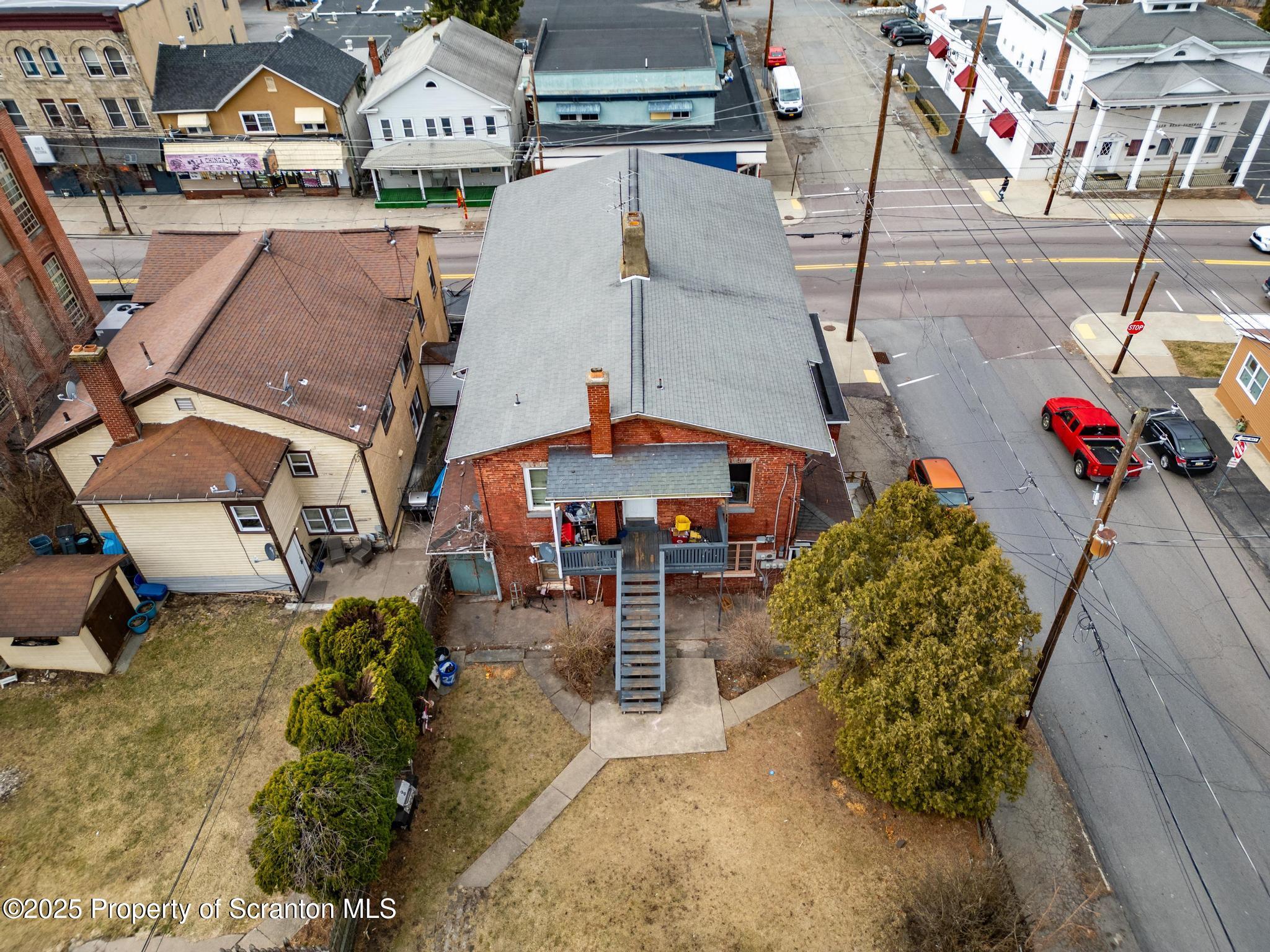 501-503 Cedar Avenue Scranton, PA 18505 - Photo 4 of 13 an aerial view of a house with a yard