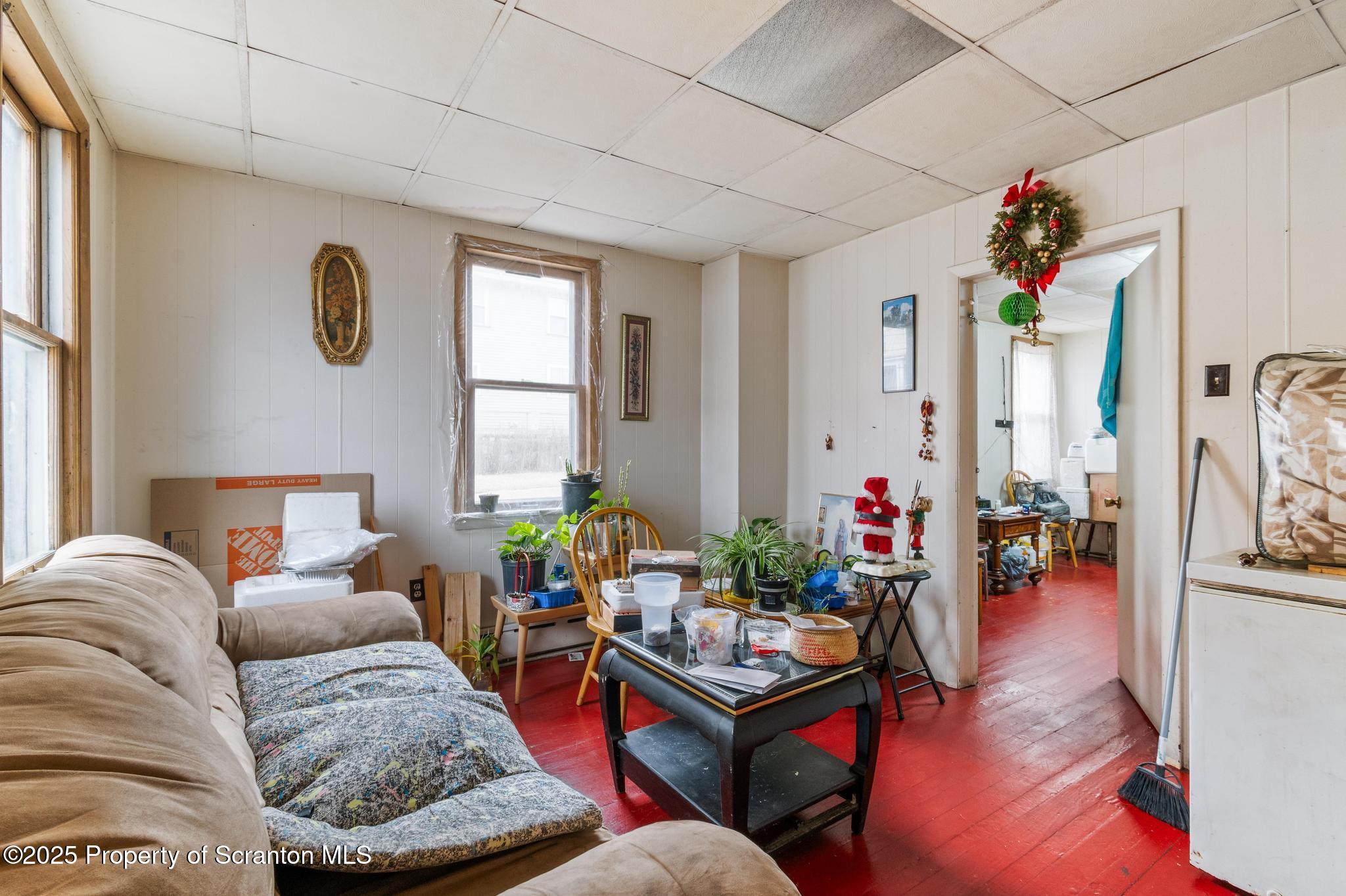 501-503 Cedar Avenue Scranton, PA 18505 - Photo 7 of 13 a living room with furniture rug and window
