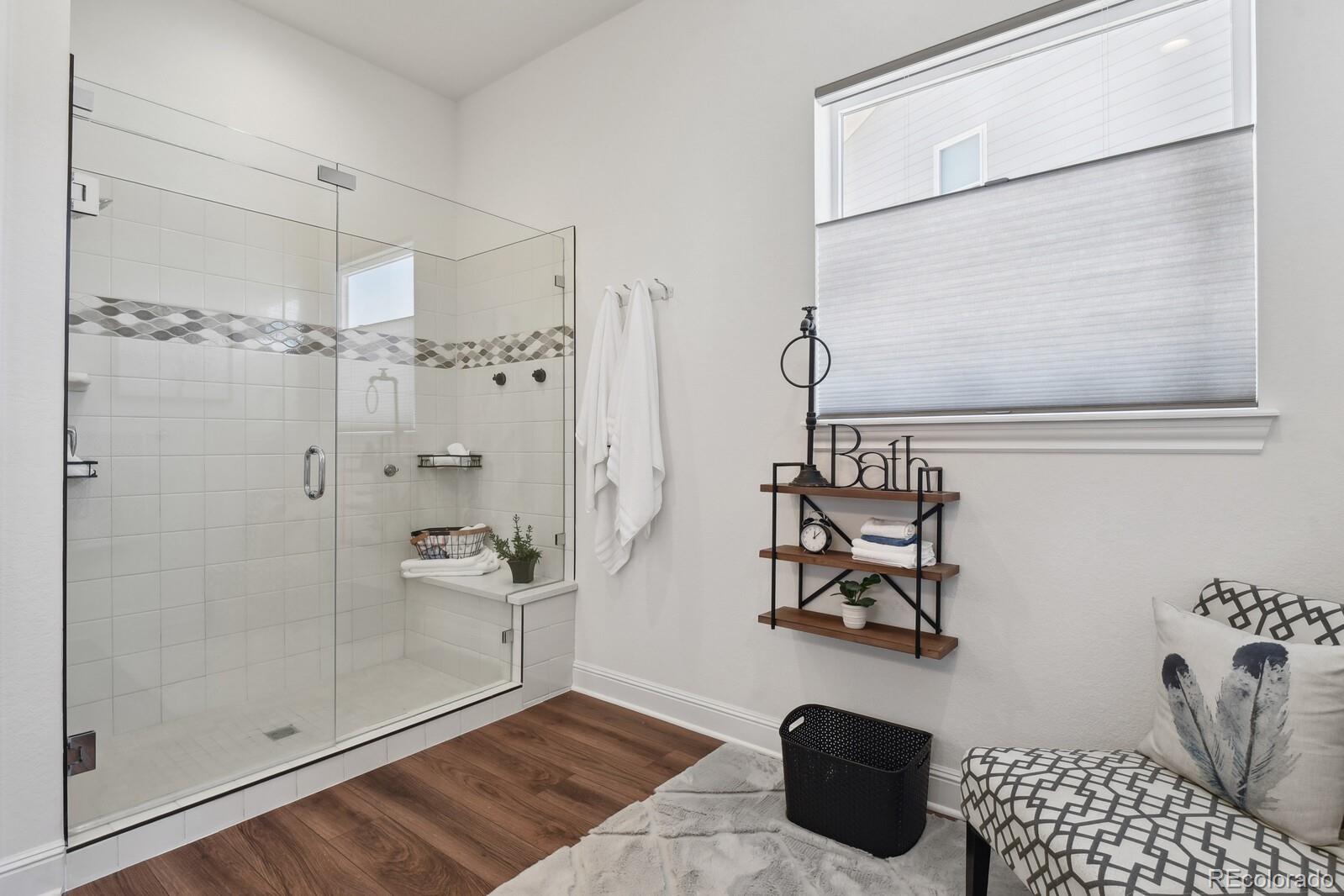328 Simmental Loop Castle Rock, CO 80104 - Photo 11 of 20 a bathroom with a shower