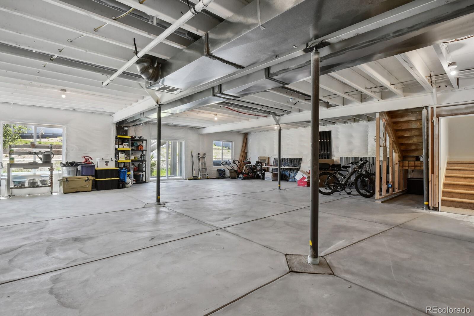 328 Simmental Loop Castle Rock, CO 80104 - Photo 15 of 20 a view of parking garage with furniture