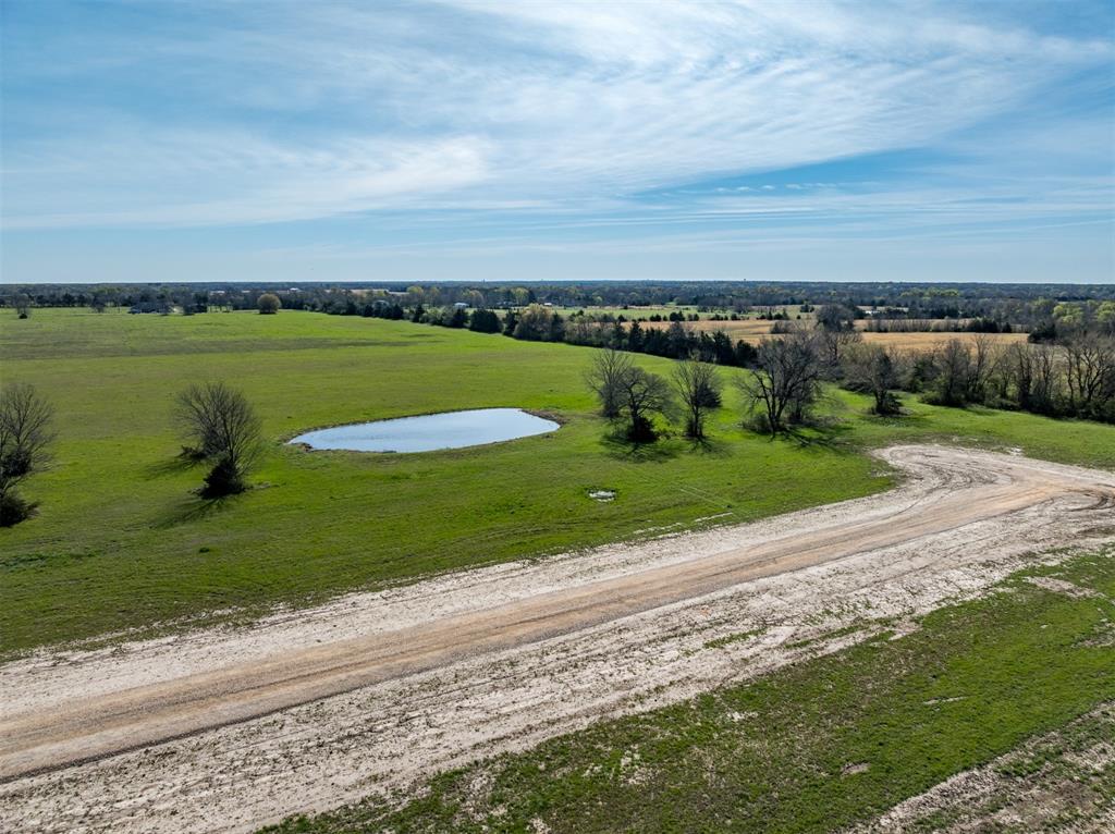 311 Private Road Sumner, TX 75486 - Photo 2 of 9 a view of a lake with a city