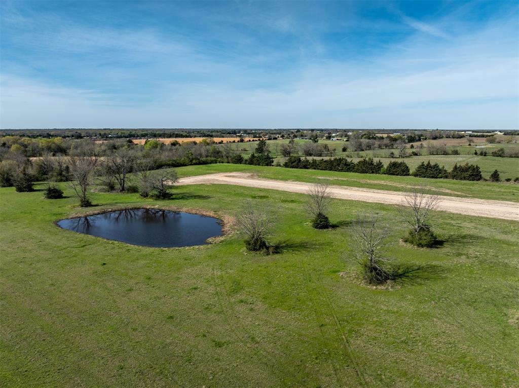311 Private Road Sumner, TX 75486 - Photo 4 of 9 a view of a lake with a city