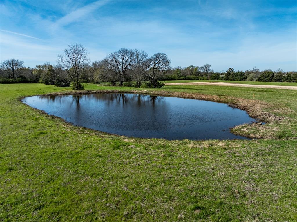 311 Private Road Sumner, TX 75486 - Photo 5 of 9 a view of a lake with houses in the back