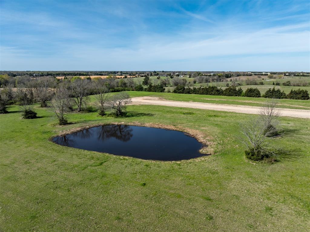 311 Private Road Sumner, TX 75486 - Photo 6 of 9 a view of a lake with a city