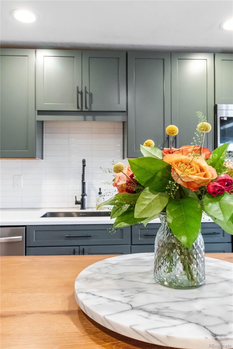 2701 Hooker Street Denver, CO 80211 - Photo 16 of 49 a bathroom with a sink and a mirror