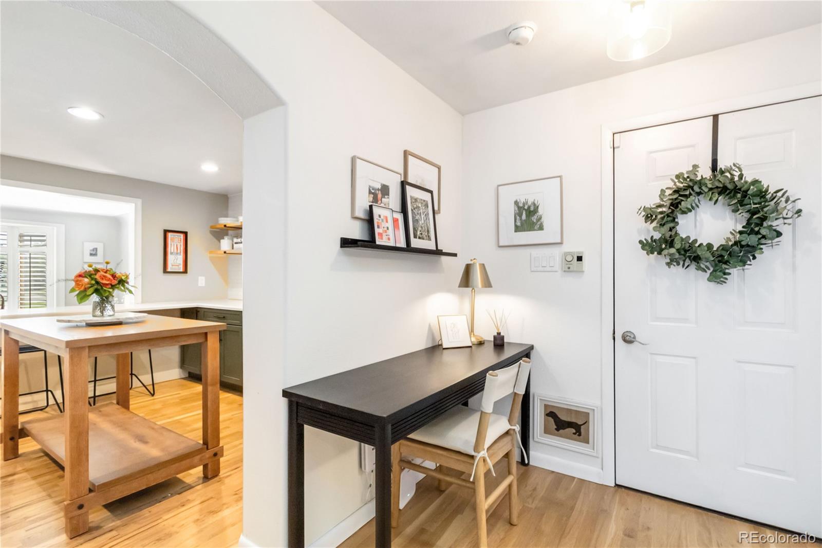 2701 Hooker Street Denver, CO 80211 - Photo 19 of 49 a living room with furniture and a potted plant