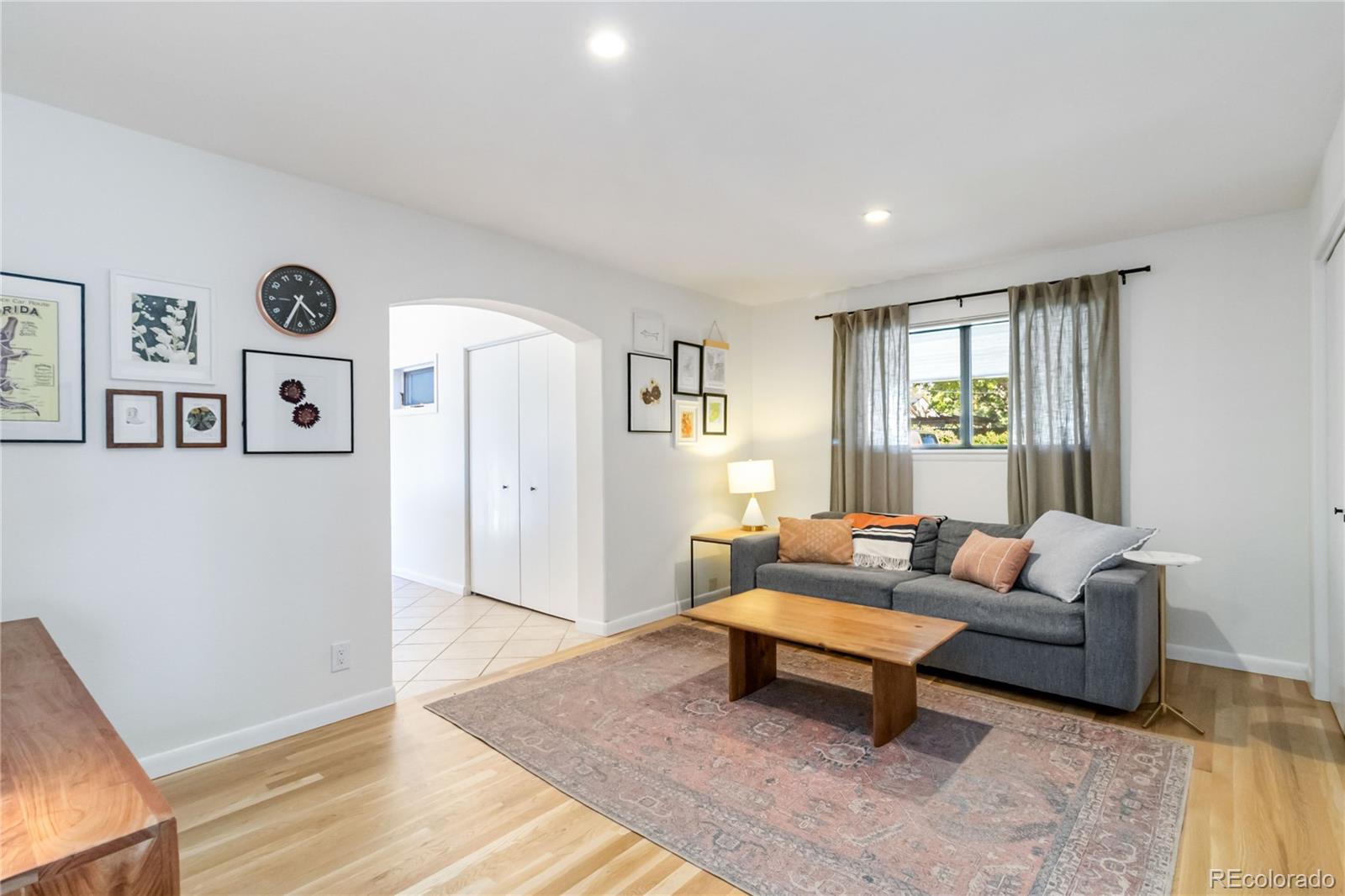 2701 Hooker Street Denver, CO 80211 - Photo 20 of 49 a living room with furniture and a rug