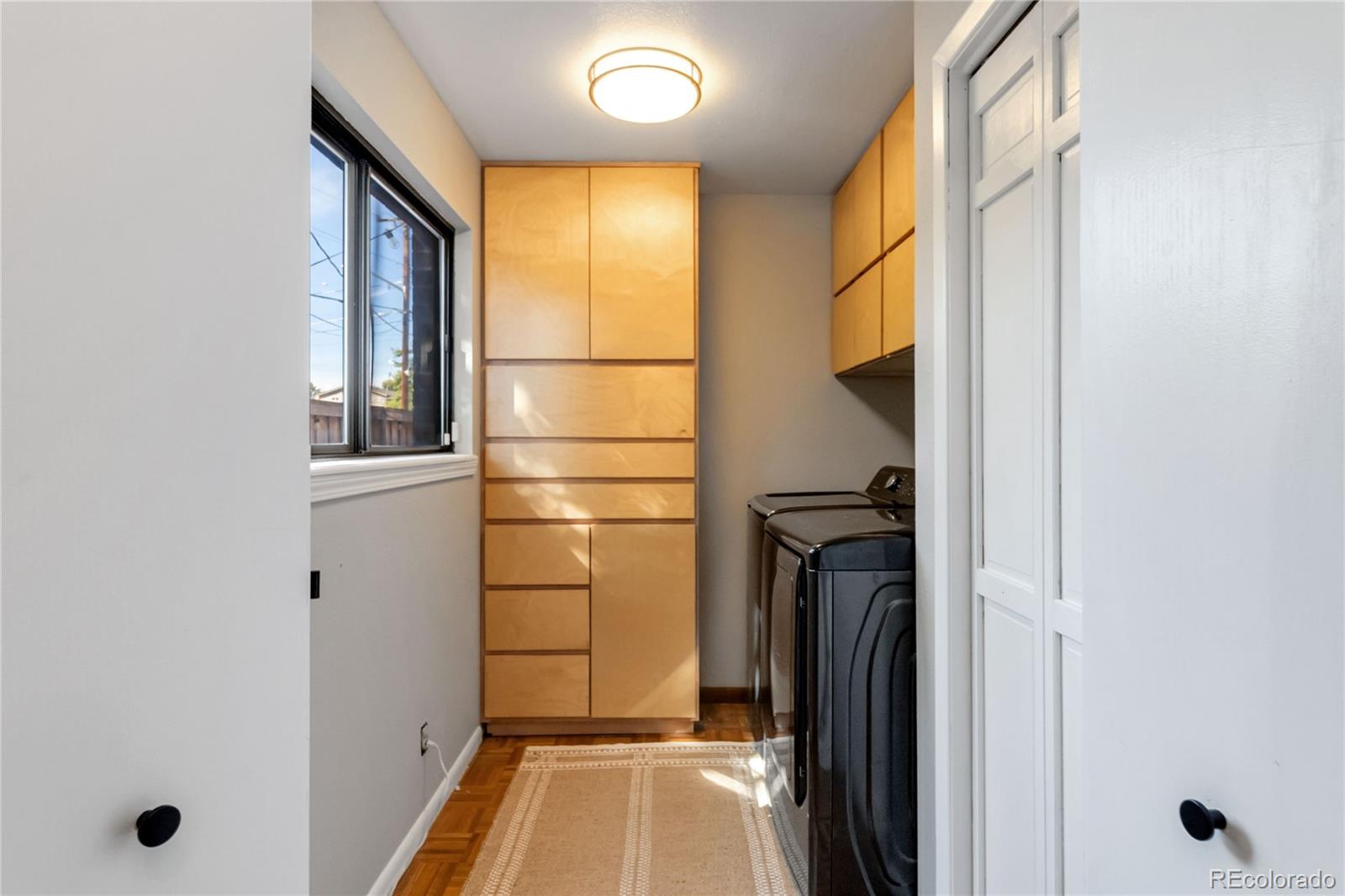 2701 Hooker Street Denver, CO 80211 - Photo 29 of 49 a bathroom with a tub and shower