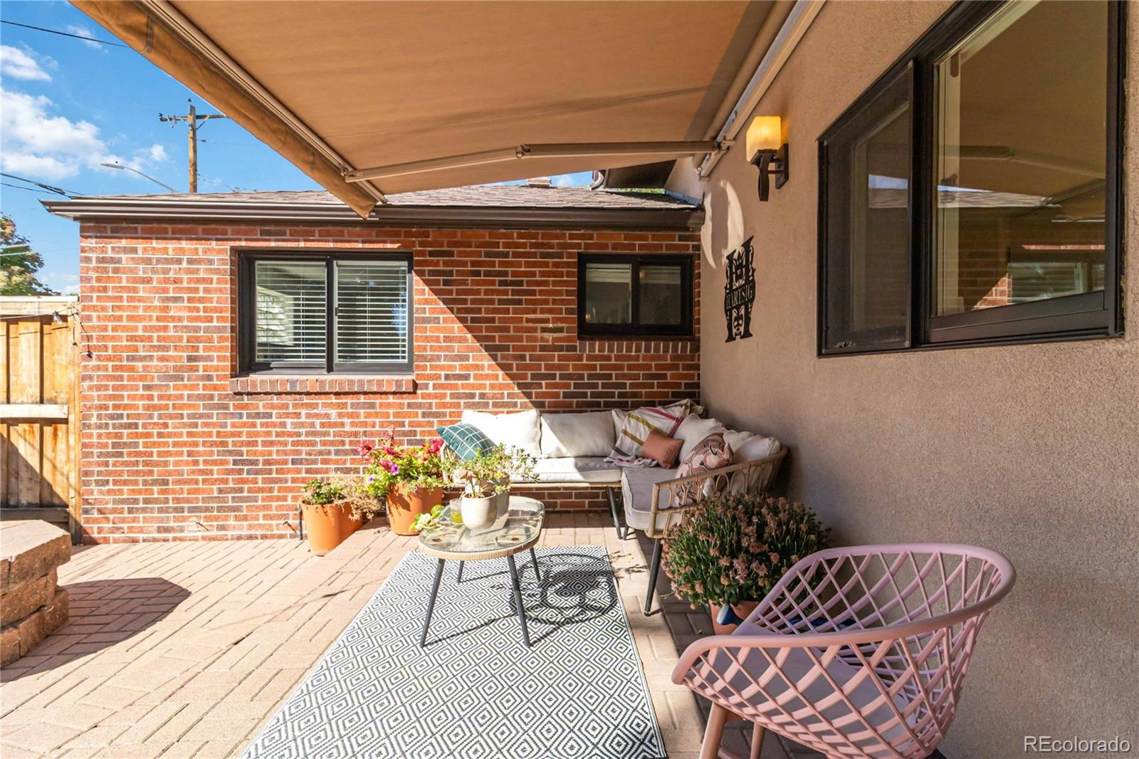 2701 Hooker Street Denver, CO 80211 - Photo 37 of 49 a view of a chairs and a table in the balcony