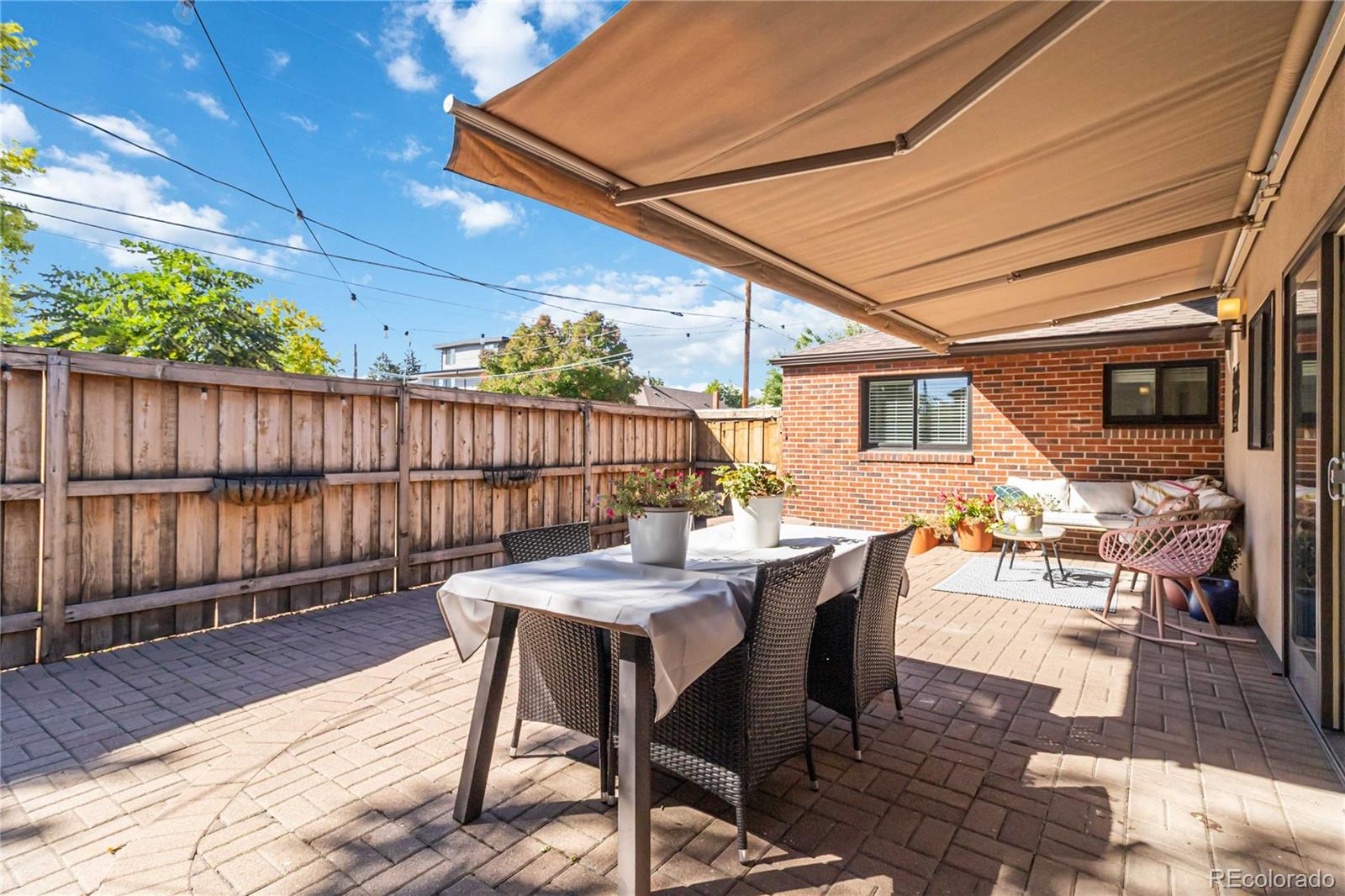 2701 Hooker Street Denver, CO 80211 - Photo 38 of 49 a outdoor dining space with furniture and wooden floor