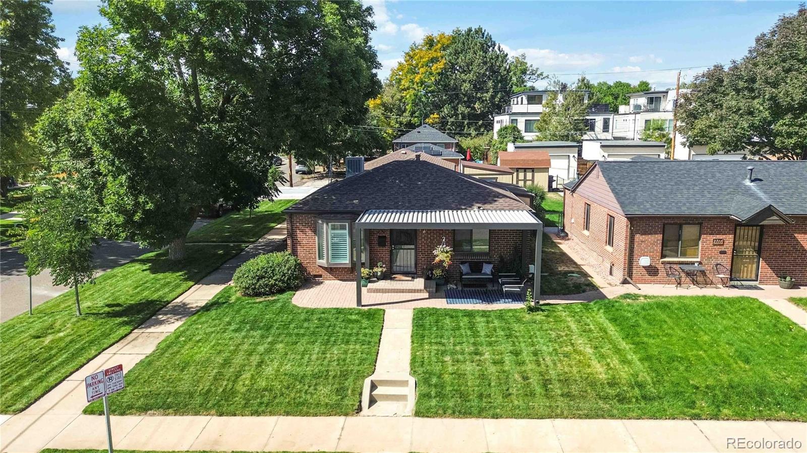 2701 Hooker Street Denver, CO 80211 - Photo 46 of 49 a front view of a house with garden