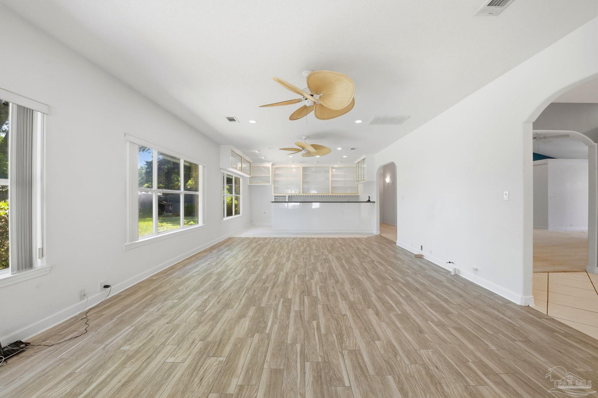 4552 Peaden Road Pace, FL 32571 - Photo 16 of 43 Display cabinets behind bar