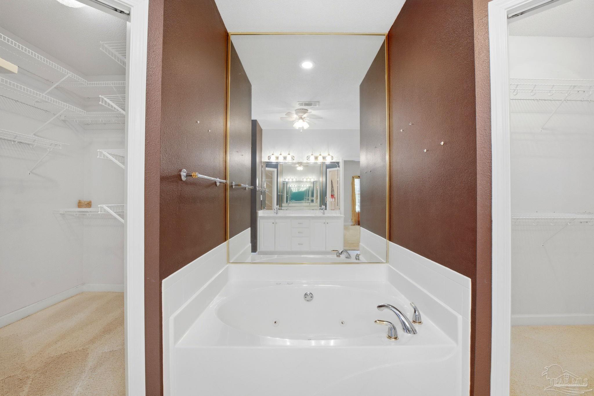 4552 Peaden Road Pace, FL 32571 - Photo 28 of 43 Closets on either side of tub