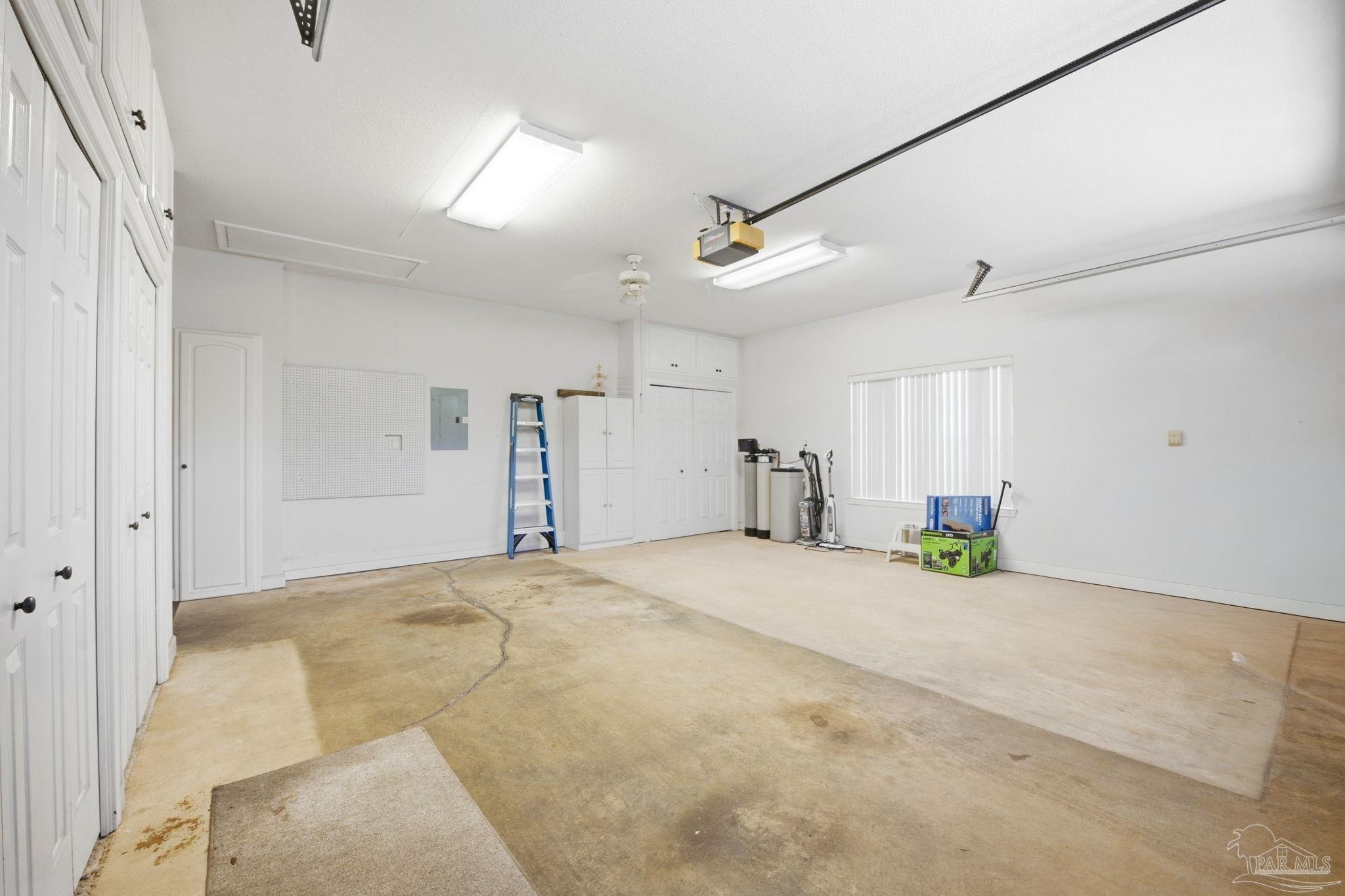 4552 Peaden Road Pace, FL 32571 - Photo 35 of 43 Storage cabinets abound!