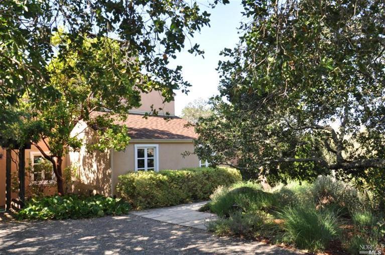 17059 High Road Sonoma, CA 95476 - Photo 1 of 1 a front view of a house with garden