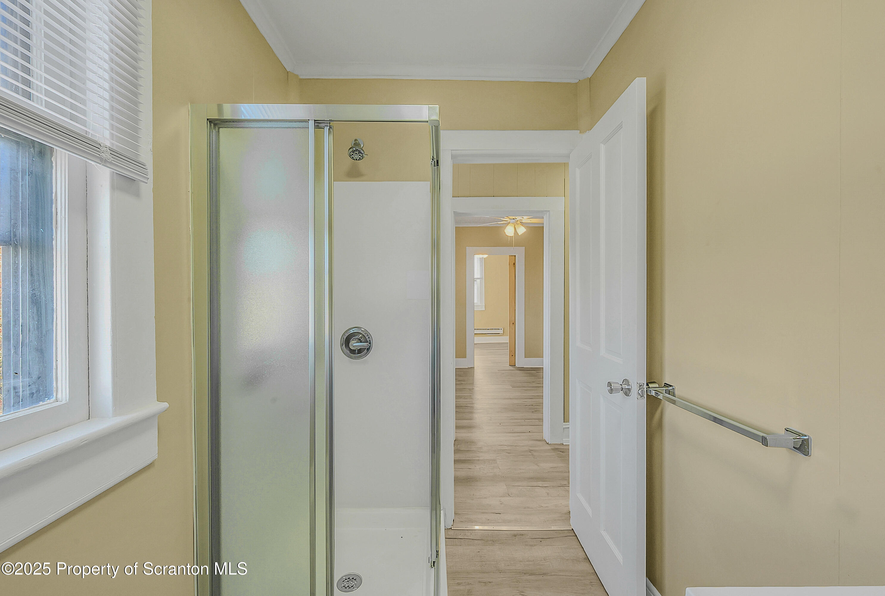 864 South Main Street, Unit 4 Old Forge, PA 18518 - Photo 14 of 17 a view of a bathroom from a hallway