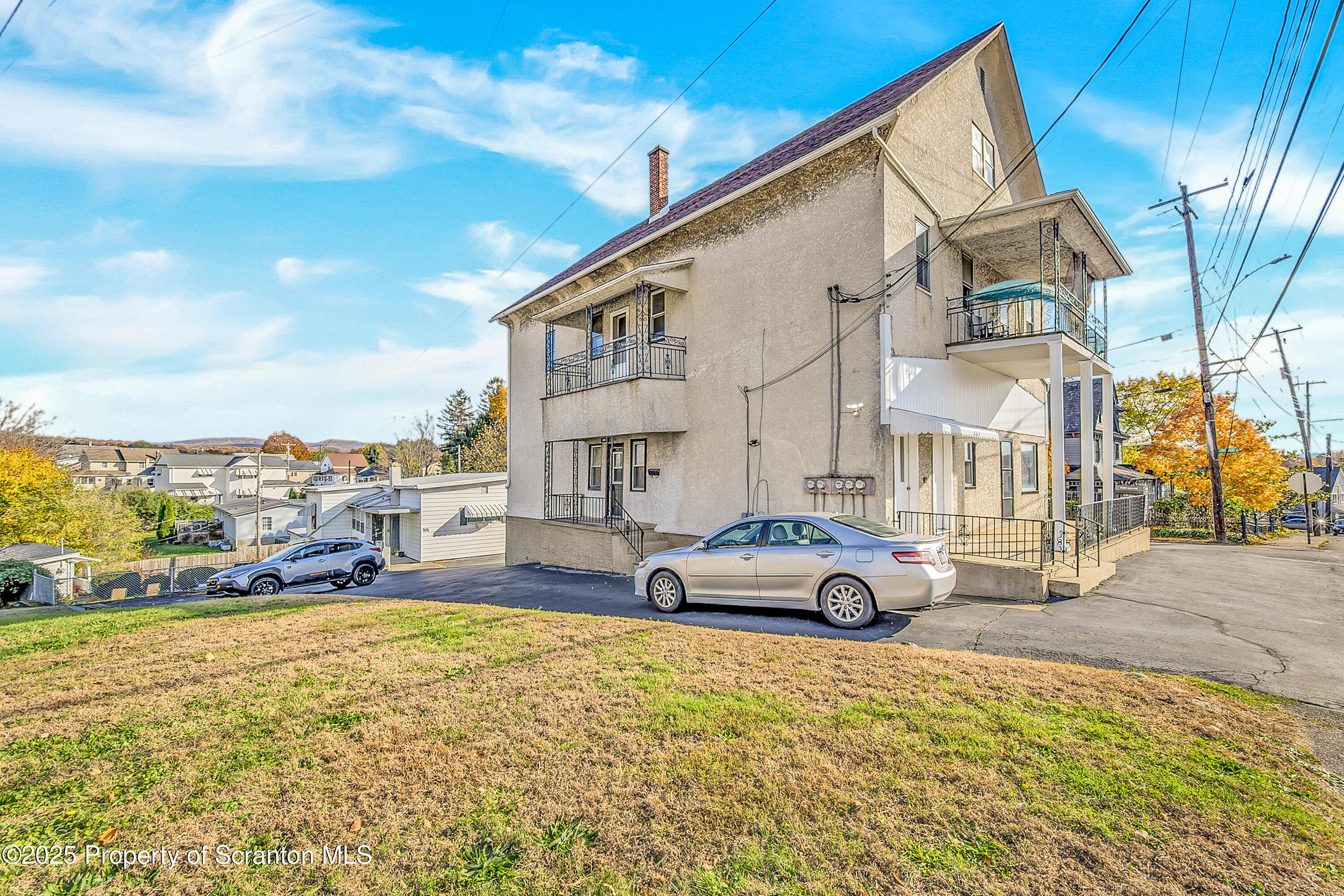 864 South Main Street, Unit 4 Old Forge, PA 18518 - Photo 2 of 17 a view of a street with cars