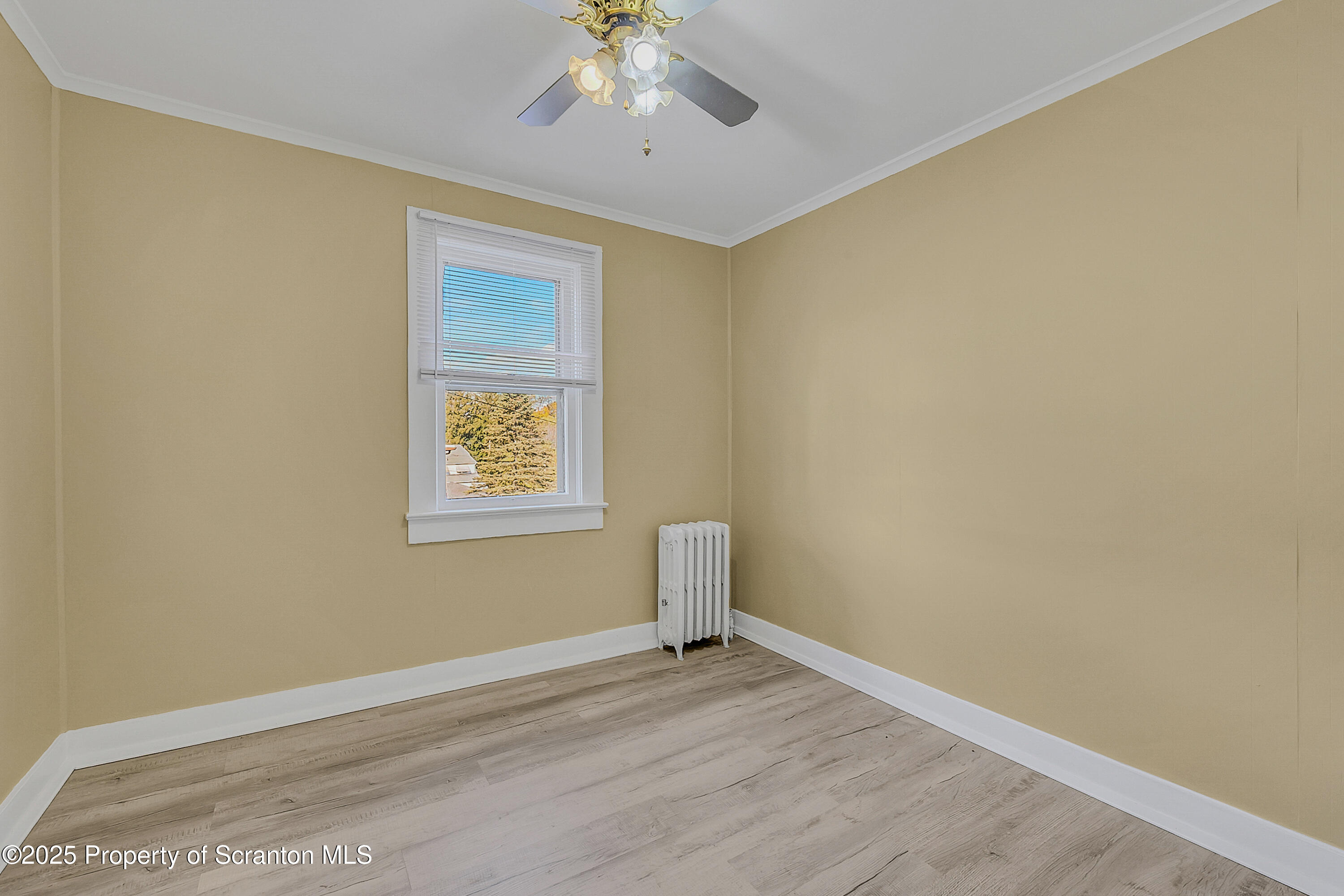 864 South Main Street, Unit 4 Old Forge, PA 18518 - Photo 8 of 17 an empty room with a window