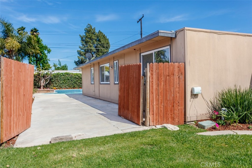 1747 North Shaffer Street Orange, CA 92865 - Photo 16 of 35 a front view of a house with garden