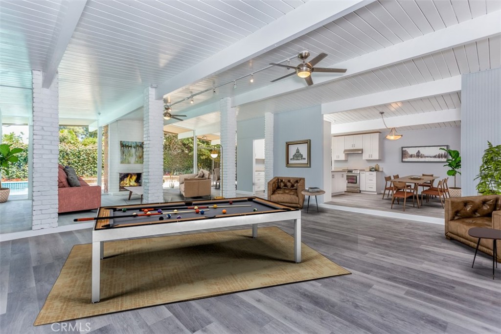 1747 North Shaffer Street Orange, CA 92865 - Photo 5 of 35 a living room with furniture and a table