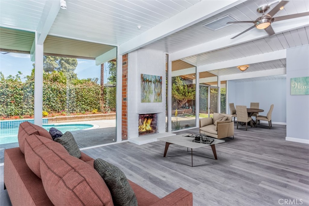 1747 North Shaffer Street Orange, CA 92865 - Photo 6 of 35 a living room with furniture and a large window