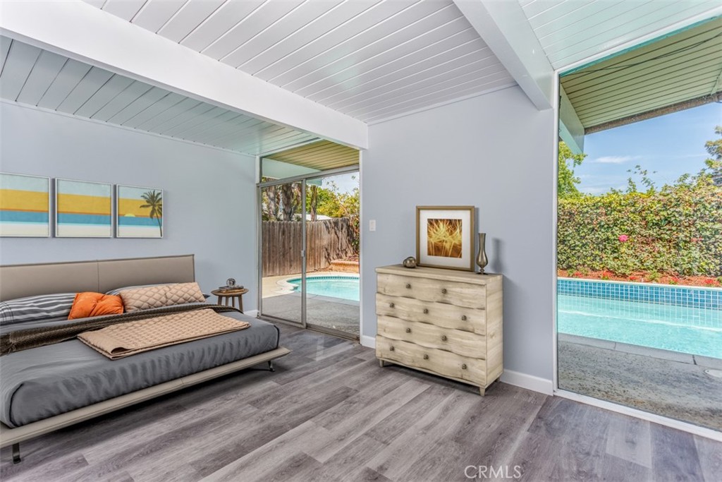 1747 North Shaffer Street Orange, CA 92865 - Photo 8 of 35 a bedroom with furniture and a window