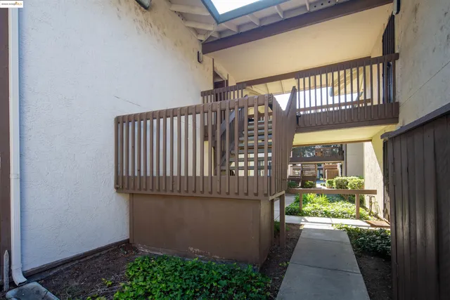 a stairs of a house with wooden floor