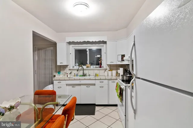 a view of living room with furniture and window
