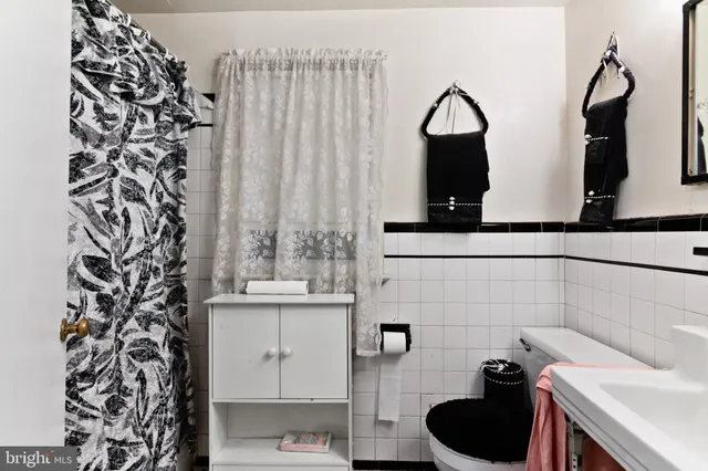 a bathroom with a sink and a toilet