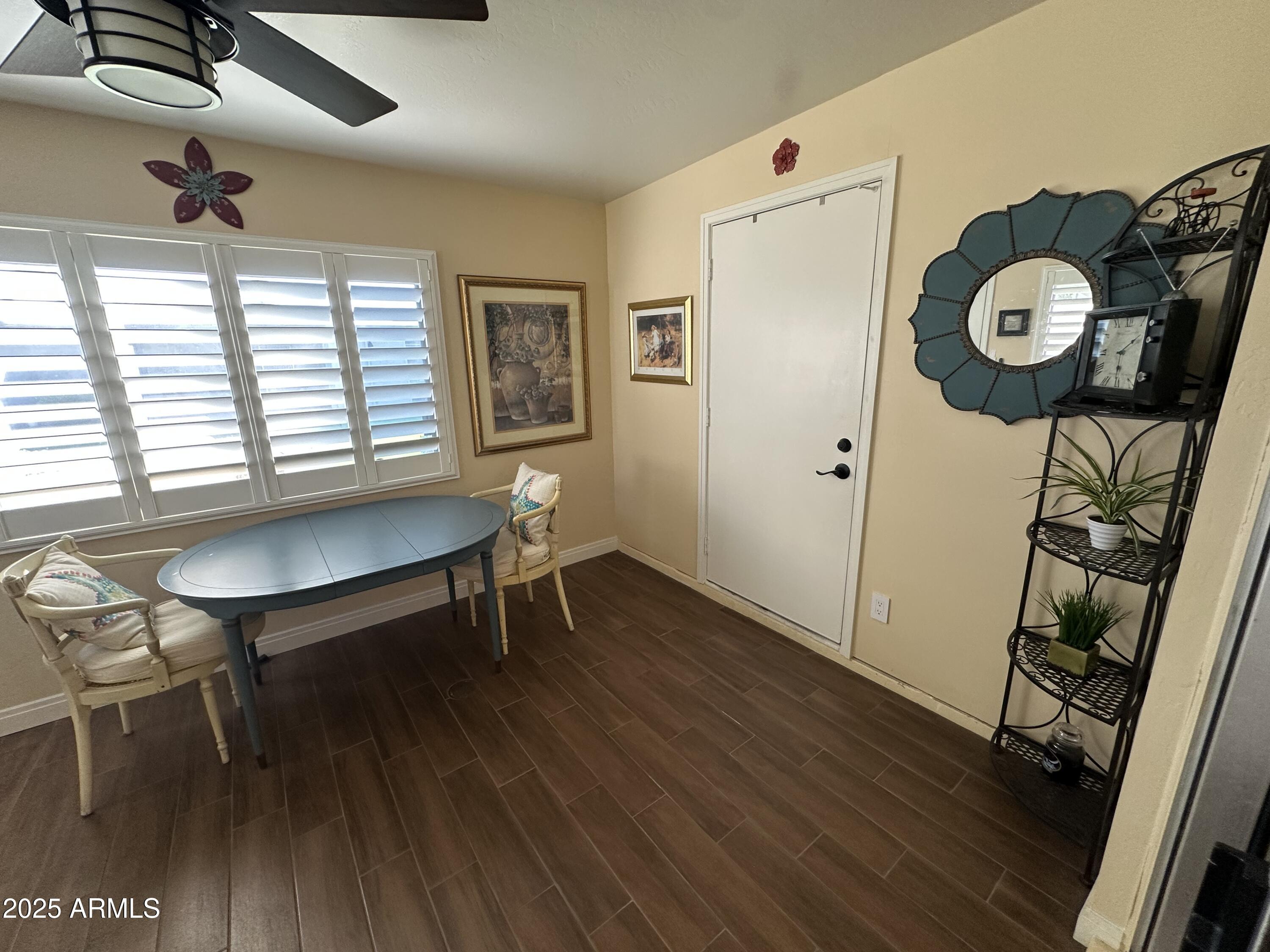 4328 East Capri Avenue, Unit 180 Mesa, AZ 85206 - Photo 19 of 38 a view of a livingroom with furniture and a window