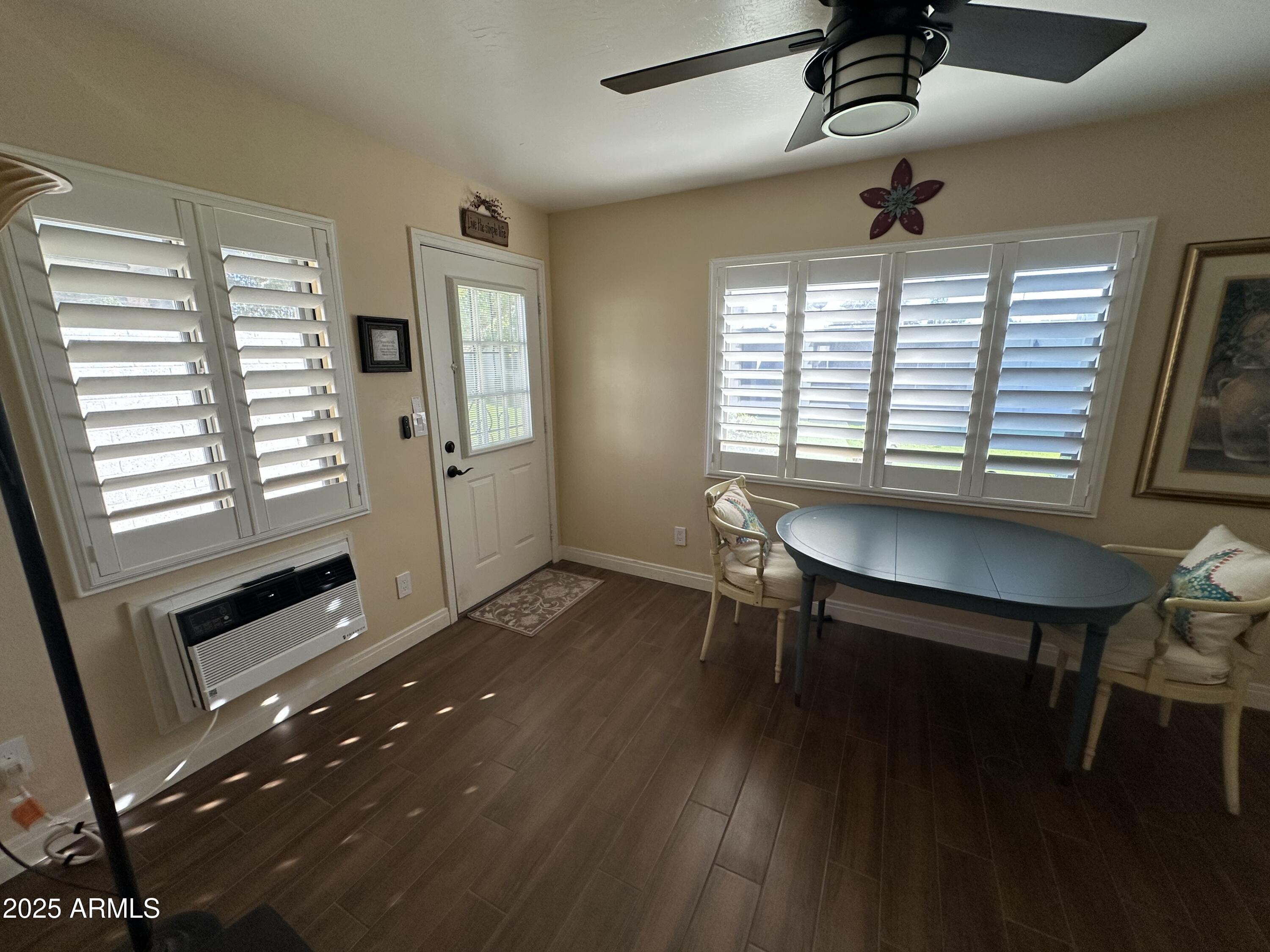 4328 East Capri Avenue, Unit 180 Mesa, AZ 85206 - Photo 20 of 38 a workspace with wooden floor