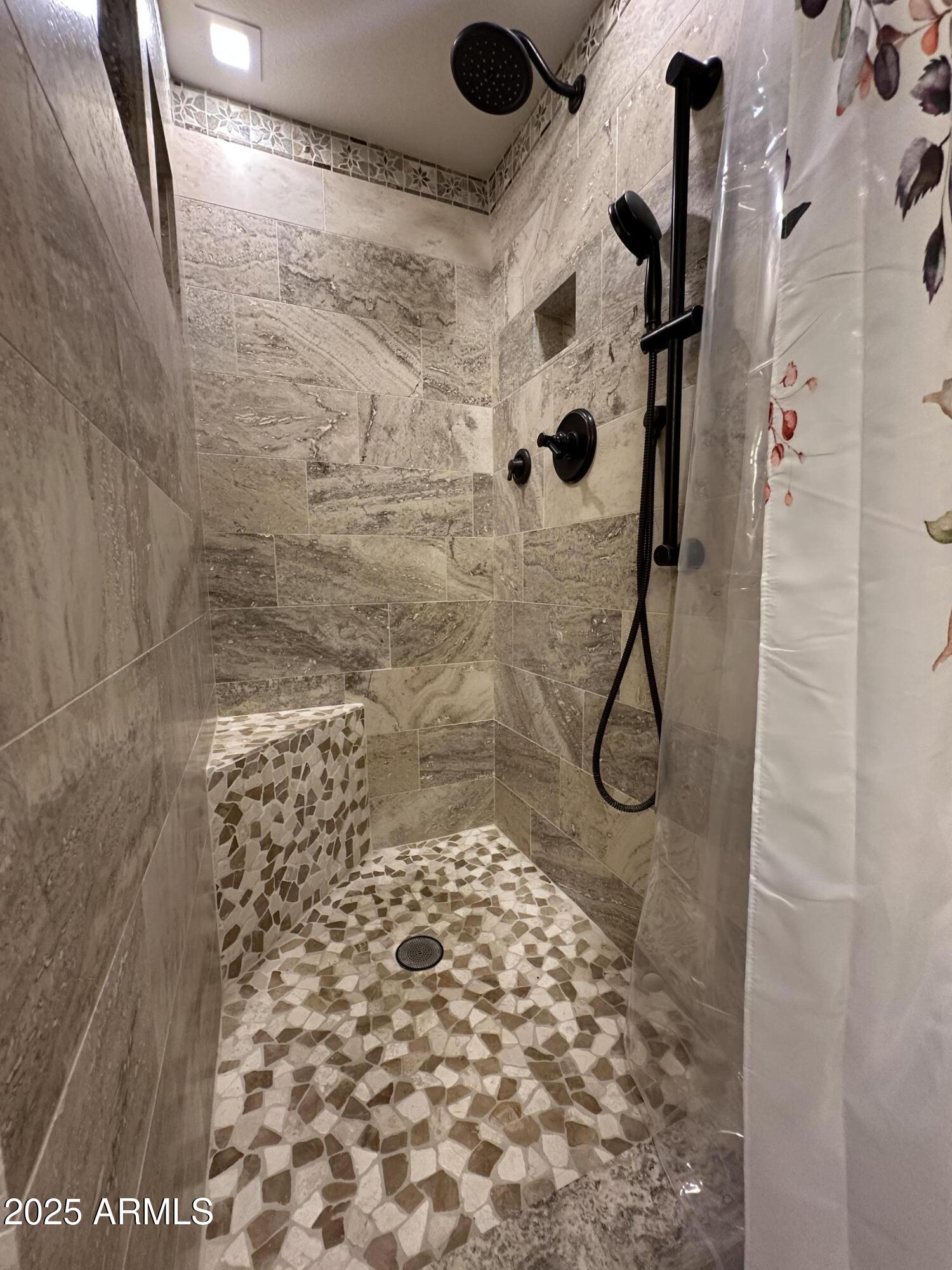 4328 East Capri Avenue, Unit 180 Mesa, AZ 85206 - Photo 26 of 38 a bathroom with a shower