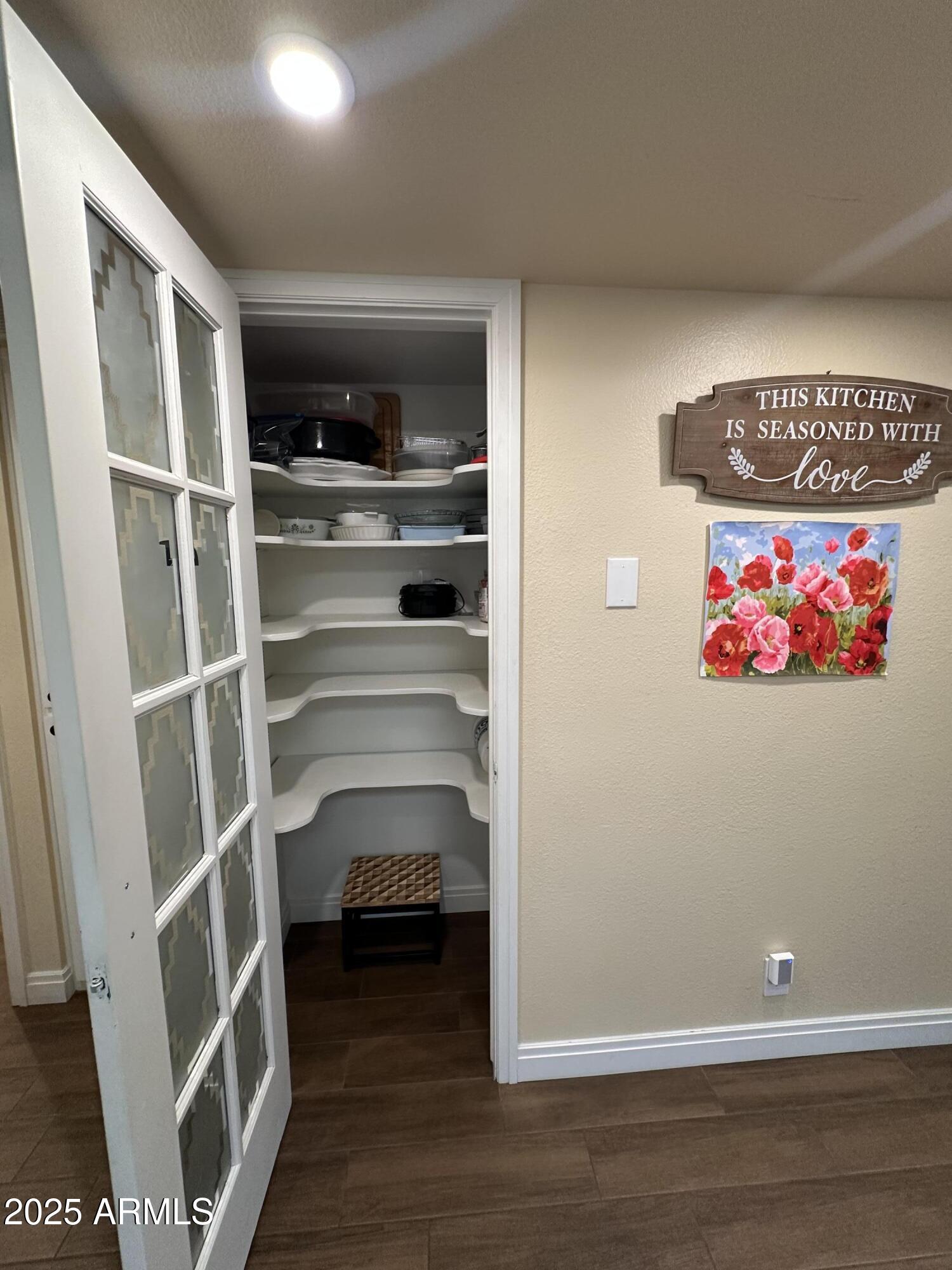 4328 East Capri Avenue, Unit 180 Mesa, AZ 85206 - Photo 32 of 38 a view of an empty walk in closet