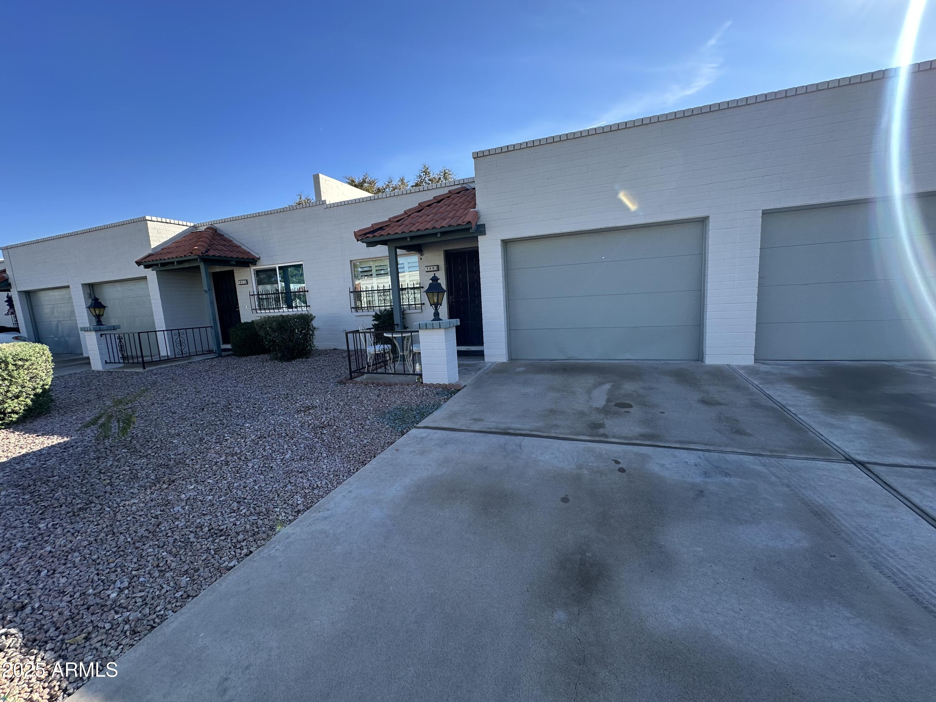 4328 East Capri Avenue, Unit 180 Mesa, AZ 85206 - Photo 38 of 38 a view of a house with a patio
