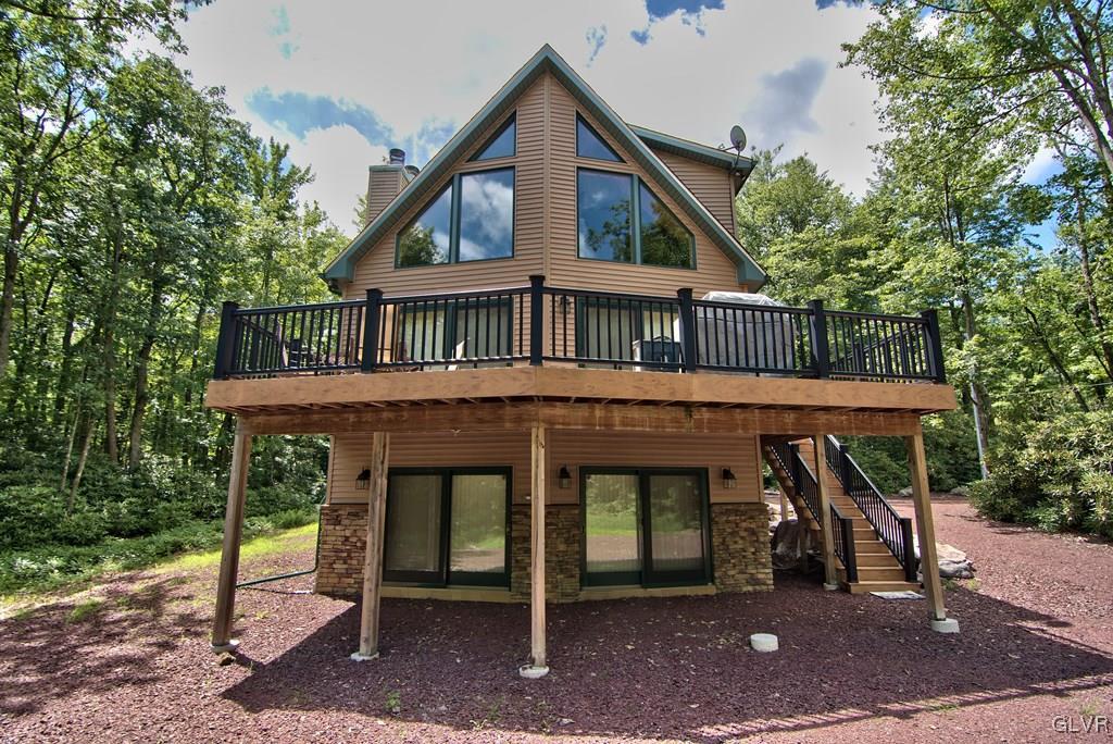 104 Rhododendron Road Jim Thorpe, PA 18229 - Photo 1 of 48 Custom from top to bottom, this 4BD/3BTH Chalet w/