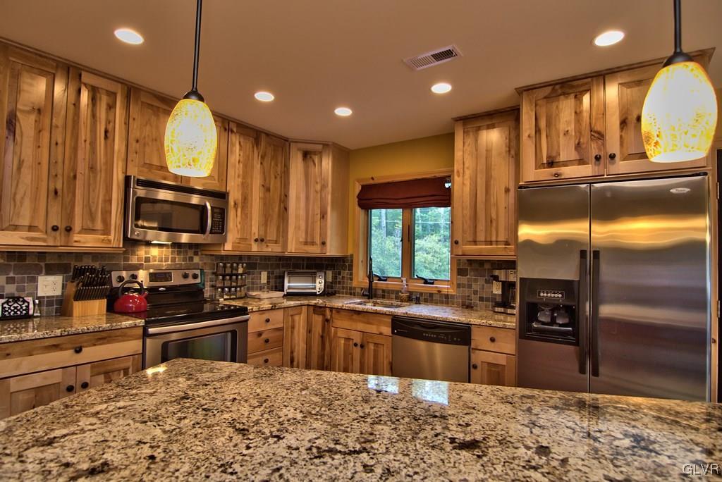 104 Rhododendron Road Jim Thorpe, PA 18229 - Photo 16 of 48 View of the granite countertop & backsplash, pende