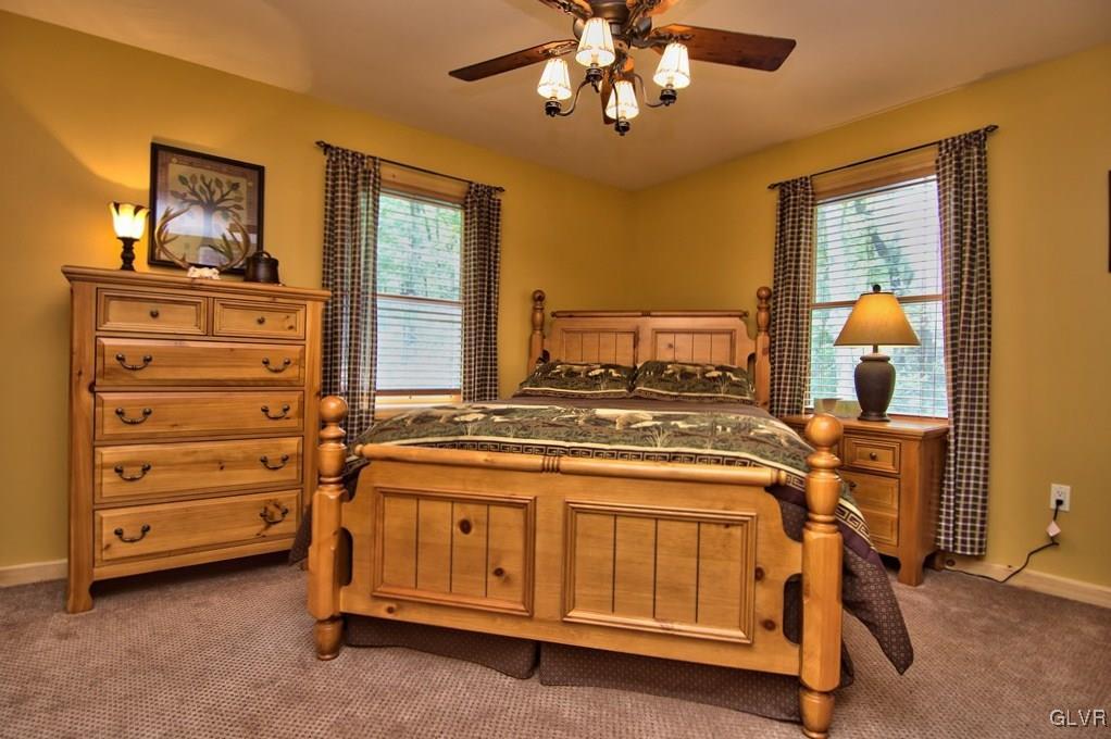 104 Rhododendron Road Jim Thorpe, PA 18229 - Photo 20 of 48 Bedroom 2 has wall-to-wall carpeting, a lighted fa