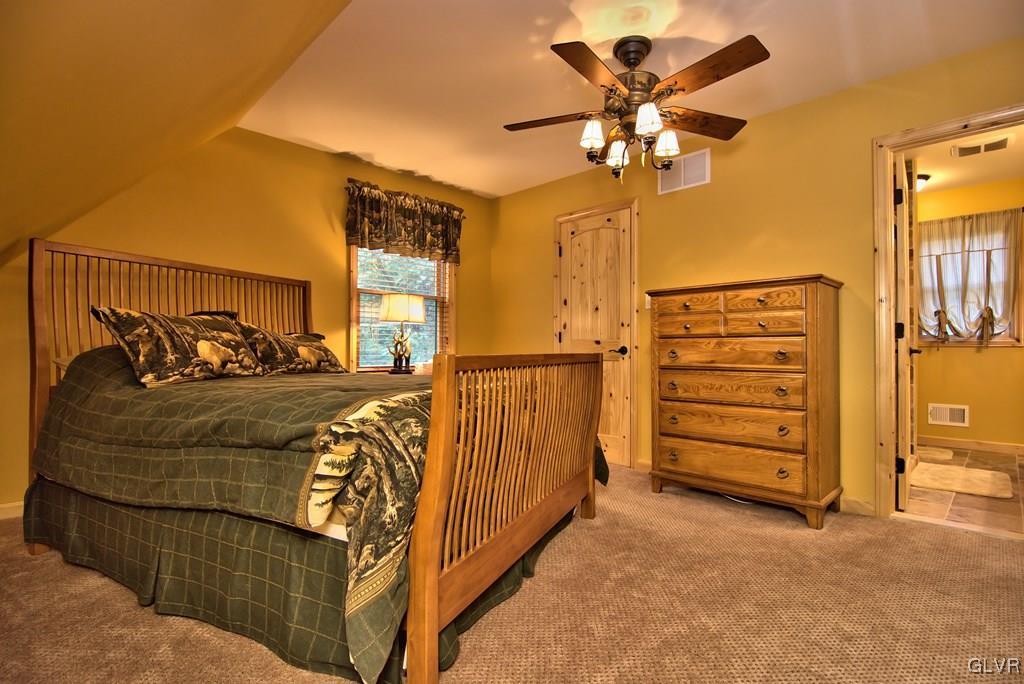 104 Rhododendron Road Jim Thorpe, PA 18229 - Photo 27 of 48 The Master Suite has wall-to-wall carpeting, a lig