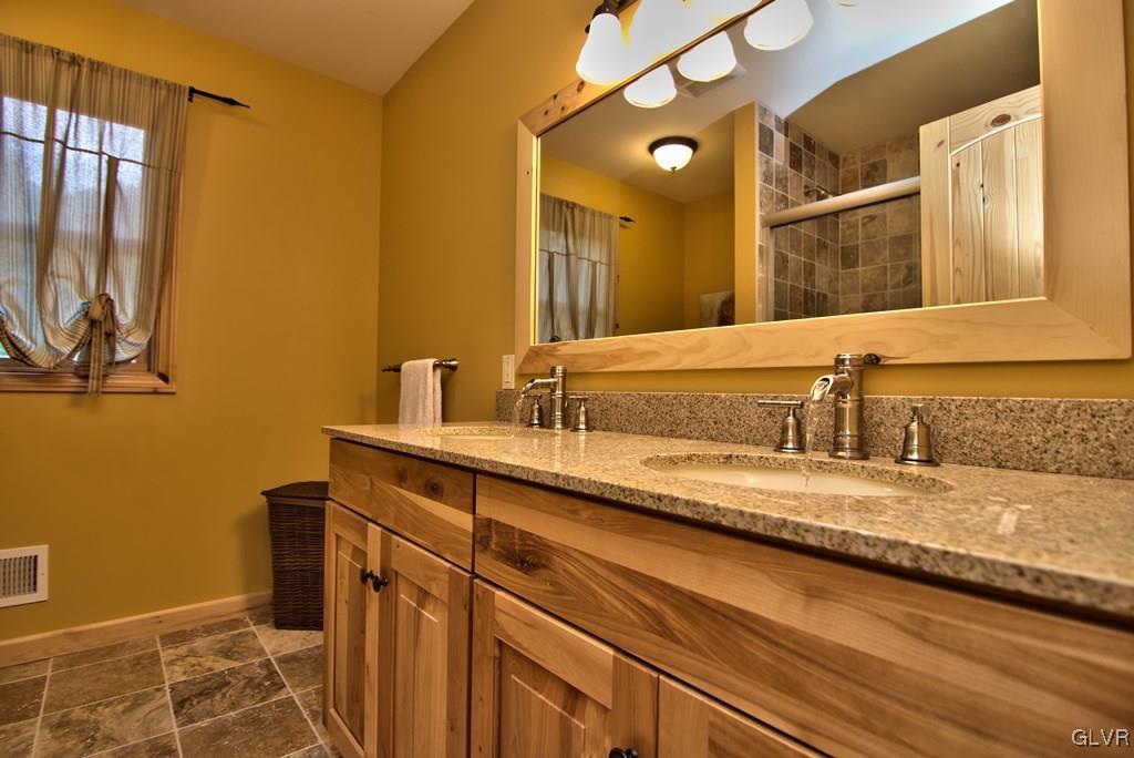 104 Rhododendron Road Jim Thorpe, PA 18229 - Photo 30 of 48 The Master Bath has tile floors, a custom solid ha