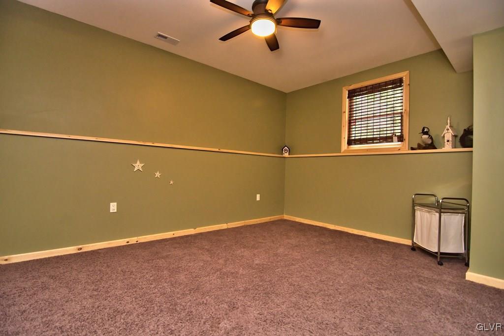 104 Rhododendron Road Jim Thorpe, PA 18229 - Photo 41 of 48 The lower level bedroom has wall-to-wall carpeting