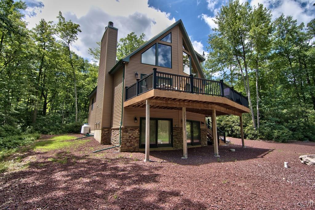 104 Rhododendron Road Jim Thorpe, PA 18229 - Photo 5 of 48 The home is light & bright with 4 front-facing sli