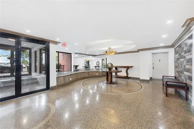 a view of kitchen with table and workspace