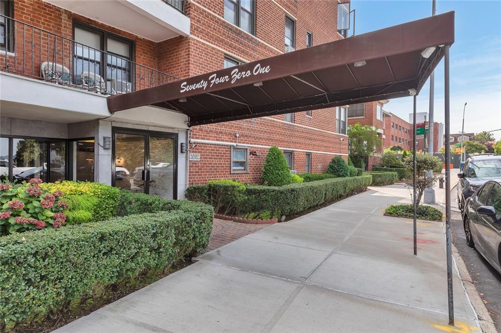 7401 Shore Road, Unit 2A Brooklyn, NY 11209 - Photo 21 of 22 a patio with a table and chairs under an umbrella