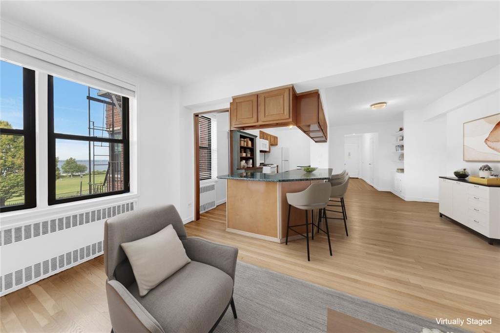 7401 Shore Road, Unit 2A Brooklyn, NY 11209 - Photo 5 of 22 a living room with furniture and a wooden floor