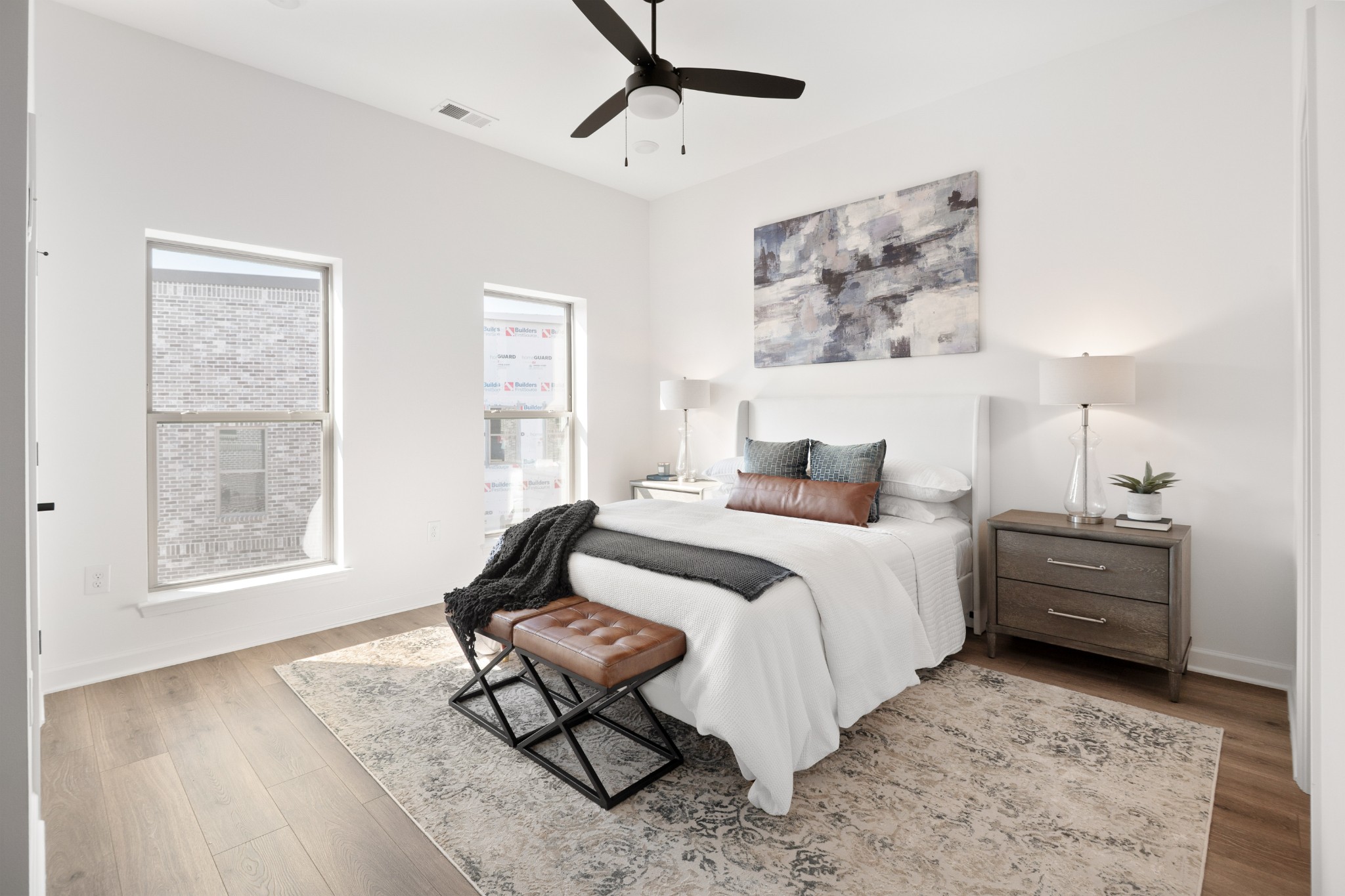 357 B Wellows Chase Spring Hill, TN 37174 - Photo 12 of 25 a bedroom with a bed large window with wooden floor