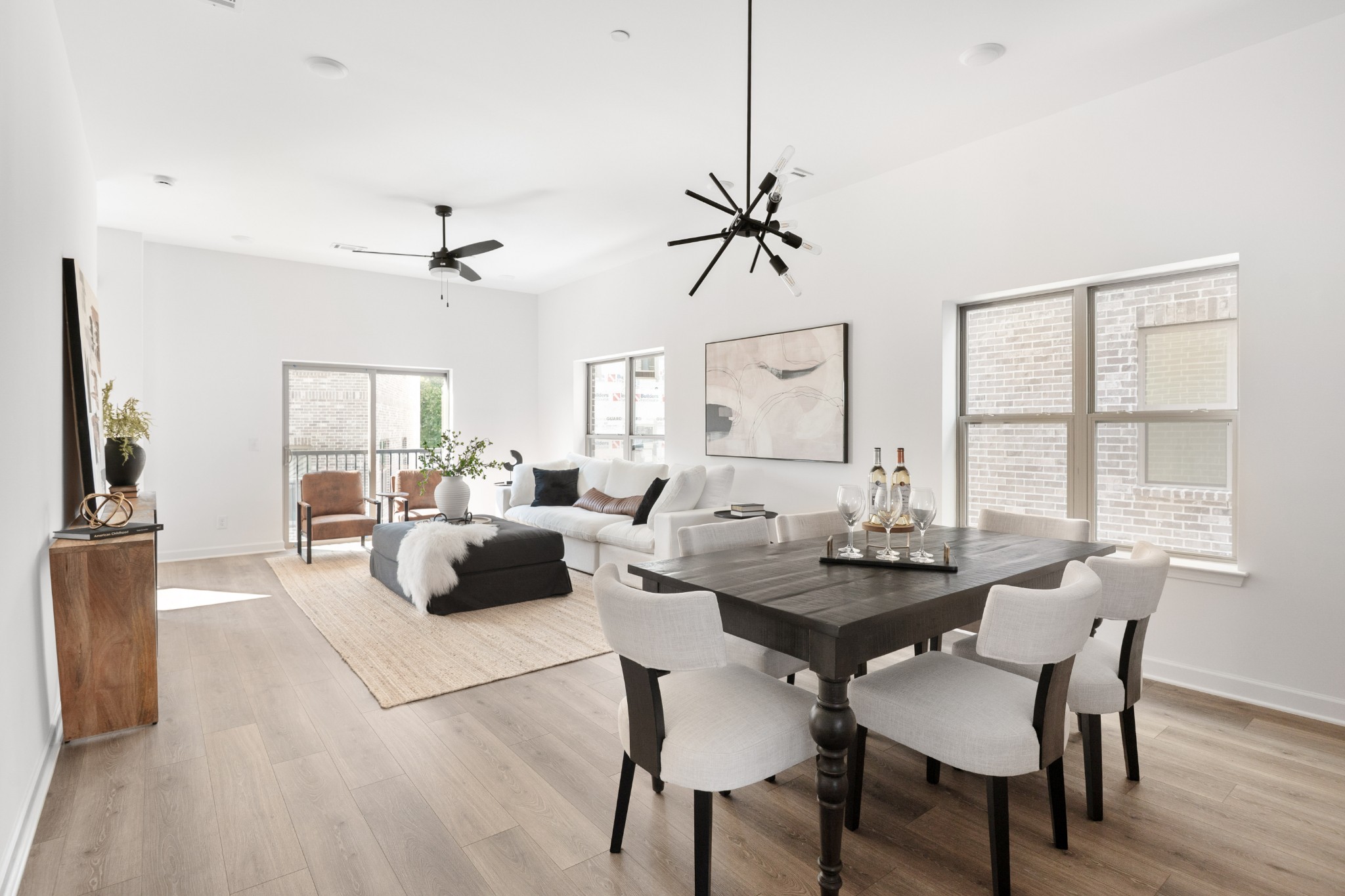 357 B Wellows Chase Spring Hill, TN 37174 - Photo 7 of 25 a view of a dining room with furniture window and wooden floor