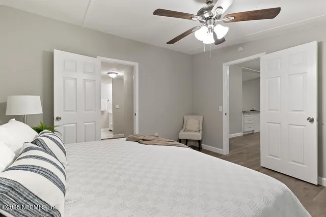 a bathroom with a sink a mirror and shower