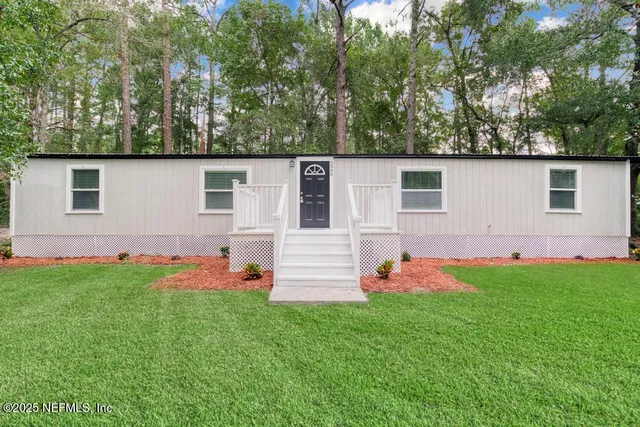 a front view of house with yard