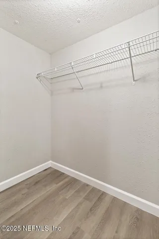 a view of a room with racks on the wall